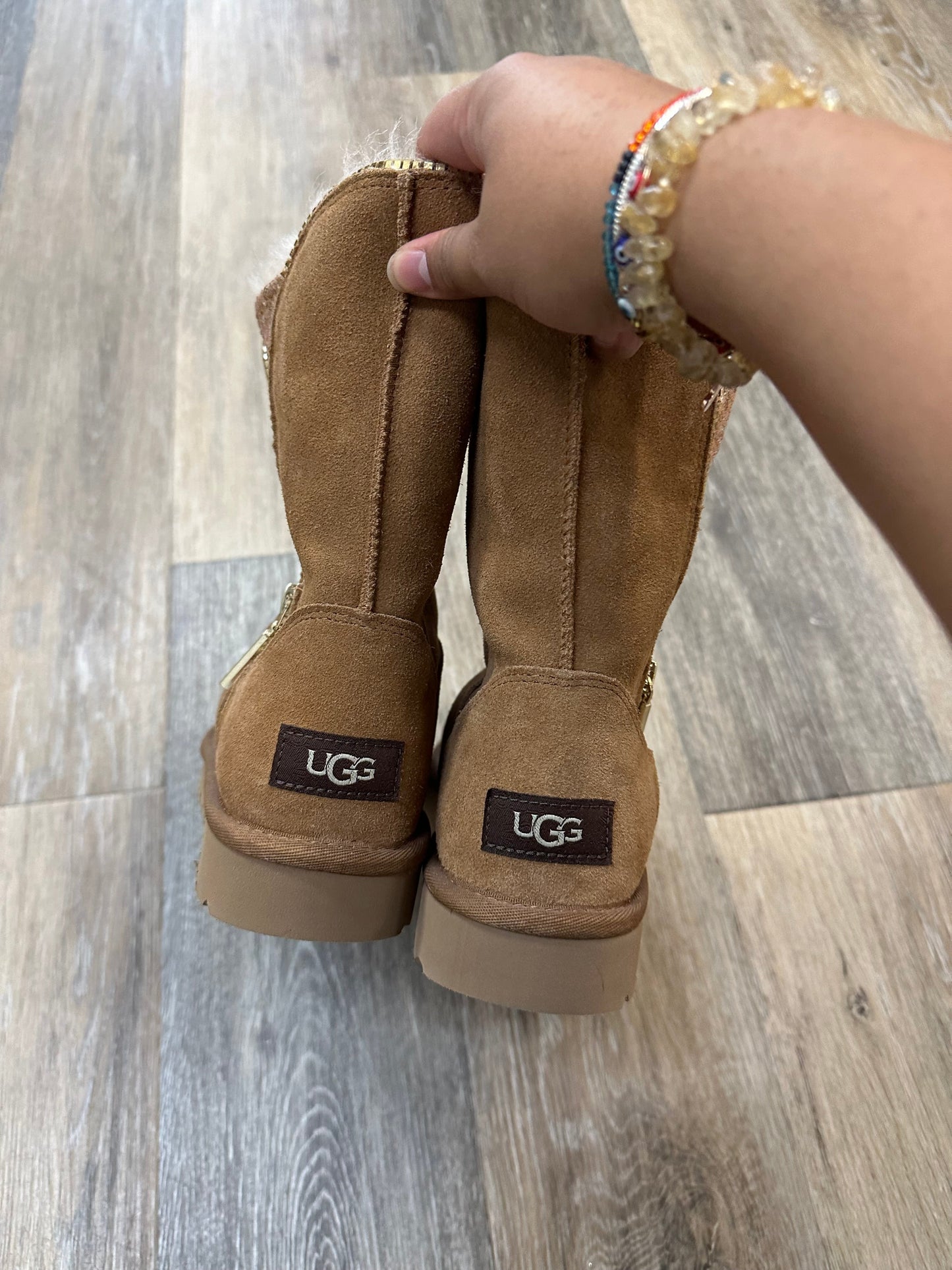 Boots Designer By Ugg In Tan, Size: 7