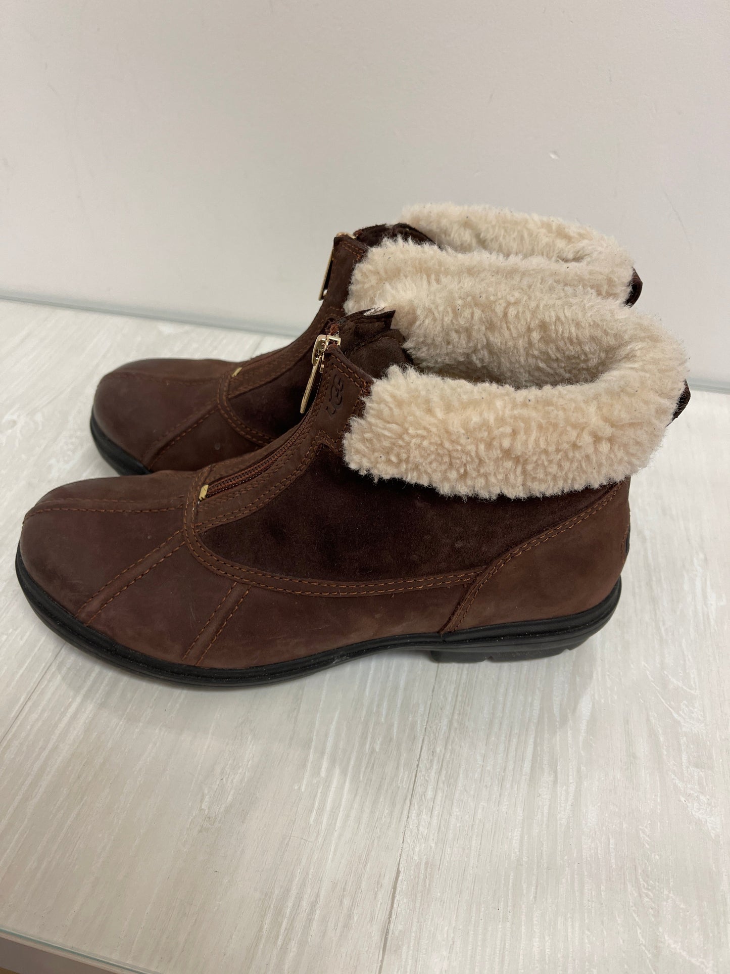 Boots Designer By Ugg In Brown, Size: 9