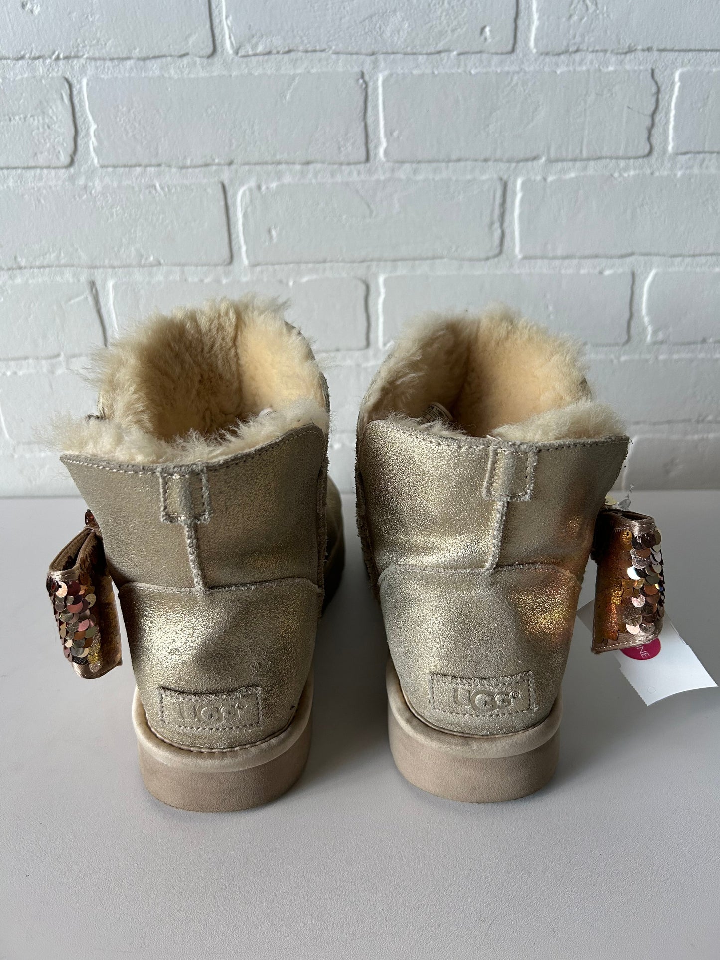 Boots Designer By Ugg In Gold, Size: 9